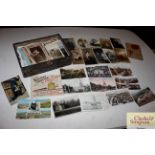 A box of miscellaneous post-cards and photographs