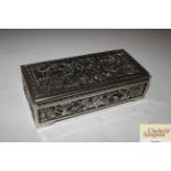 An Oriental white metal trinket box