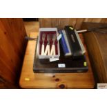 A quantity of various cutlery; books; riding crop