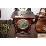 An early 20th Century oak cased mantel clock