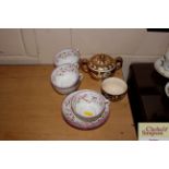 Five Victorian pink lustre tea cups and three sauc