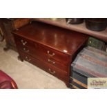 A mahogany and satin wood banded chest of two shor