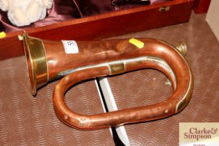 A copper and brass bugle
