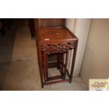 A nest of three Chinese hardwood occasional tables