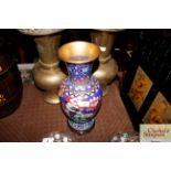 A cloisonné baluster vase on wooden stand