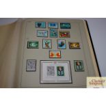 A United Nations mint collection of stamps in padded album, circa 1980, 1999, high catalogue value