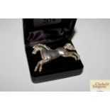 A Bent & Parker silver pony brooch