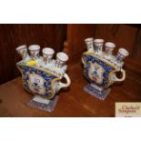 A pair of delft style bulb vases