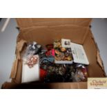 A box of miscellaneous costume jewellery