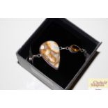 A silver citrine and hardstone set bracelet