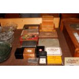 A collection of various vintage tins; wooden boxes