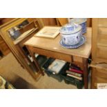 An antique oak side table fitted with a single dra