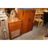A 1930's oak gramophone and matching record cabine