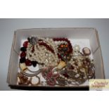 A box of miscellaneous costume jewellery