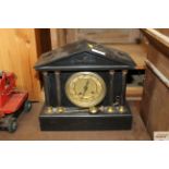 A marble cased mantel clock