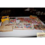 A large quantity of stamps, loose and in albums