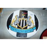 A reproduction Newcastle United plaque