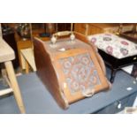 A mahogany coal scuttle