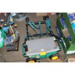 A garden trolley tool box / seat and a cycle carri