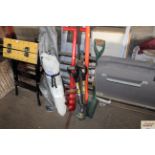 A quantity of long handled tools including auger,