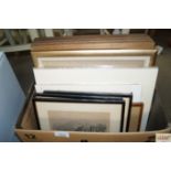 A box of various pictures and prints to include th