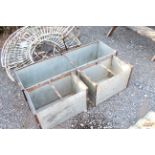 A set of three galvanised plant troughs (3)