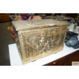 A brass embossed coal box with tavern scene decora