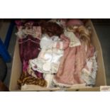 A box of various dressed dolls to include Leonardo C