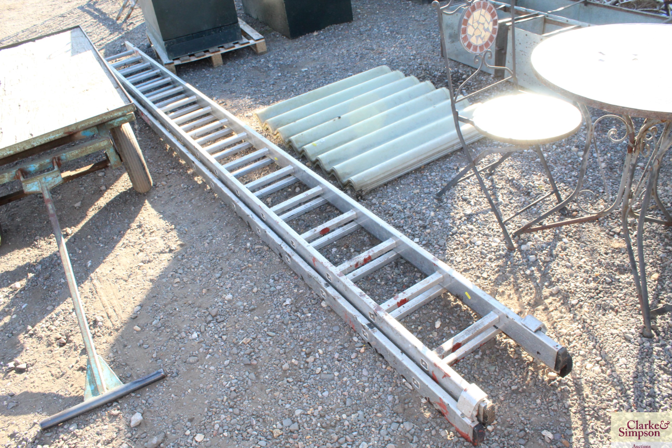 A long aluminium extending ladder