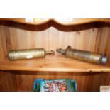 Two vintage brass fire extinguishers