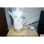 A floral decorated kettle