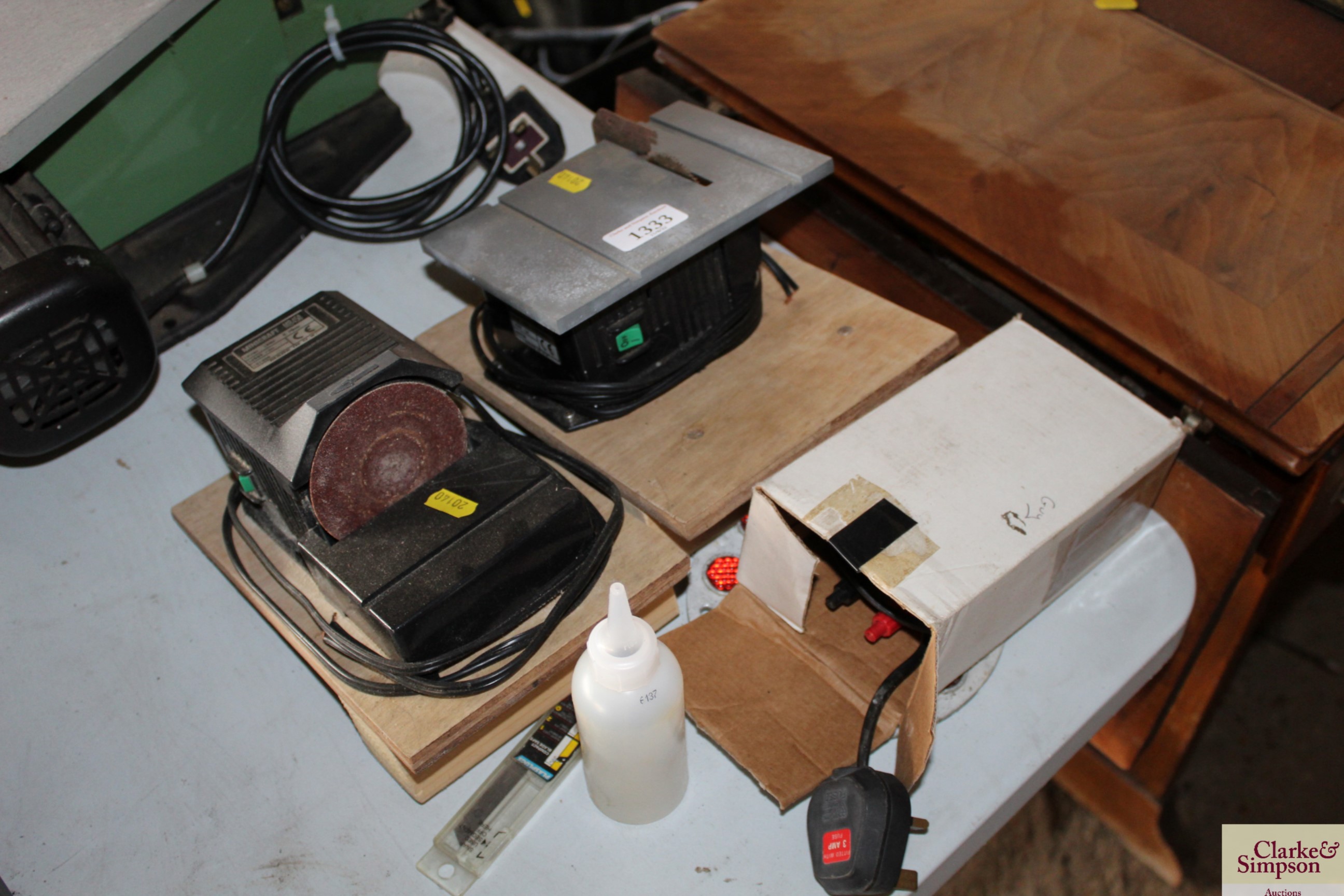 A Minicraft minature sander; a small miniature tab