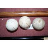 Three vintage golf balls, one bearing name (see ima