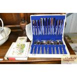A part canteen of cutlery; and two boxed sets of c