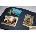 A post-card album and contents