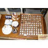 A collection of various thimbles on display racks