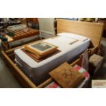 A wicker effect double bed frame