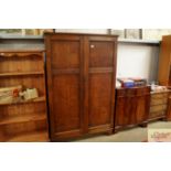 An oak two door wardrobe