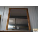 A pine framed wall mirror