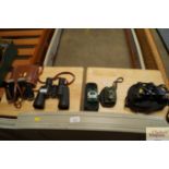 A pair of Miranda 15 x 35 binoculars together with