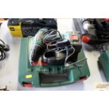 A Bosch cordless drill with charger and case