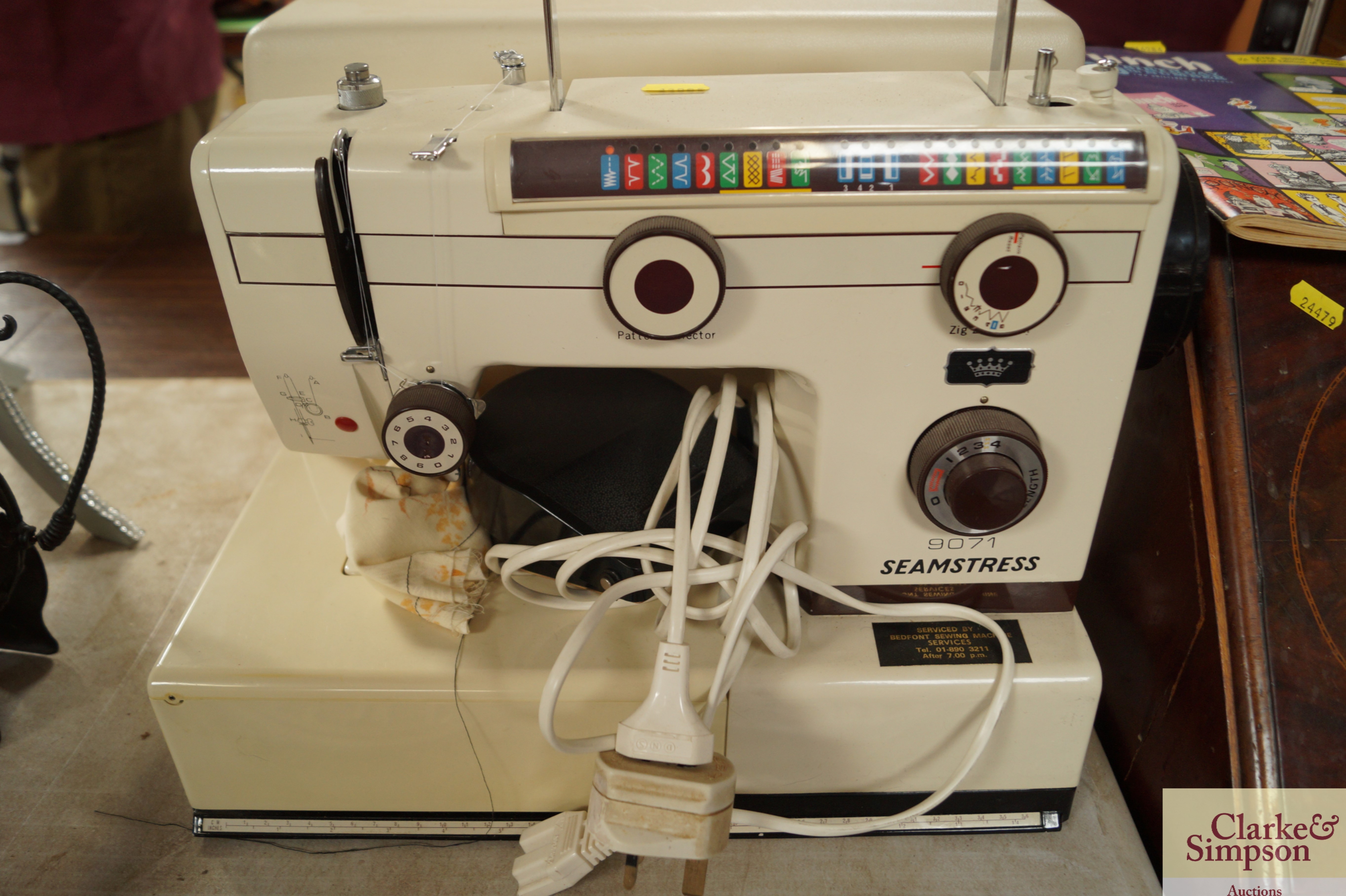 A Seamstress 9071 sewing machine in fitted case