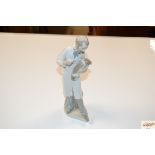 A Lladro figure in the form of a Vet