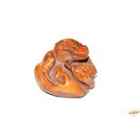 A netsuke in the form of a frog