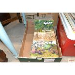 A box of various Giles annuals