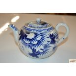 An Oriental blue and white teapot