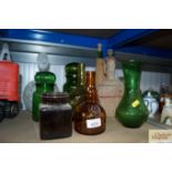 A collection of glass jars and vases