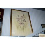 A framed print depicting flowers