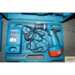 A Makita cordless drill in fitted case