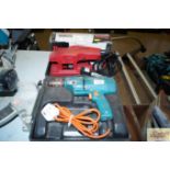 A Power Devil sander and a Black & Decker electric